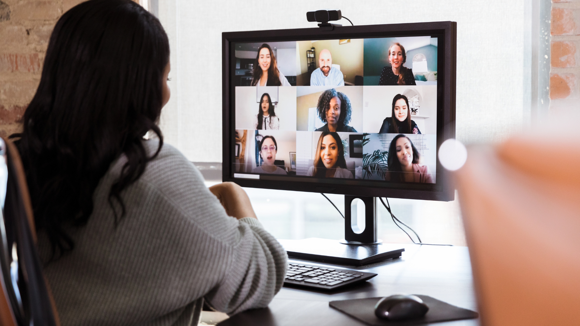 a woman in a virtual meeting