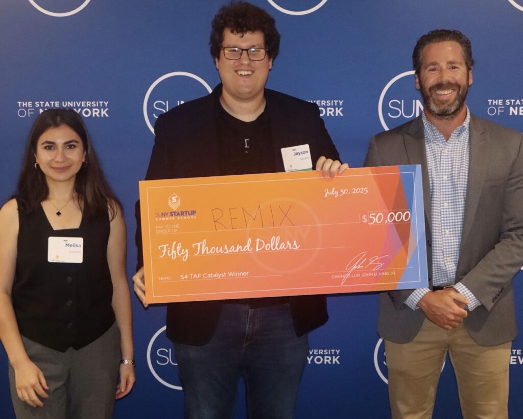 REMIX team with winning check