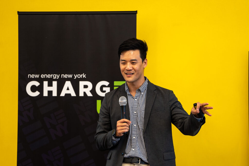 Standard Potential speaking with microphone at ChargeUp